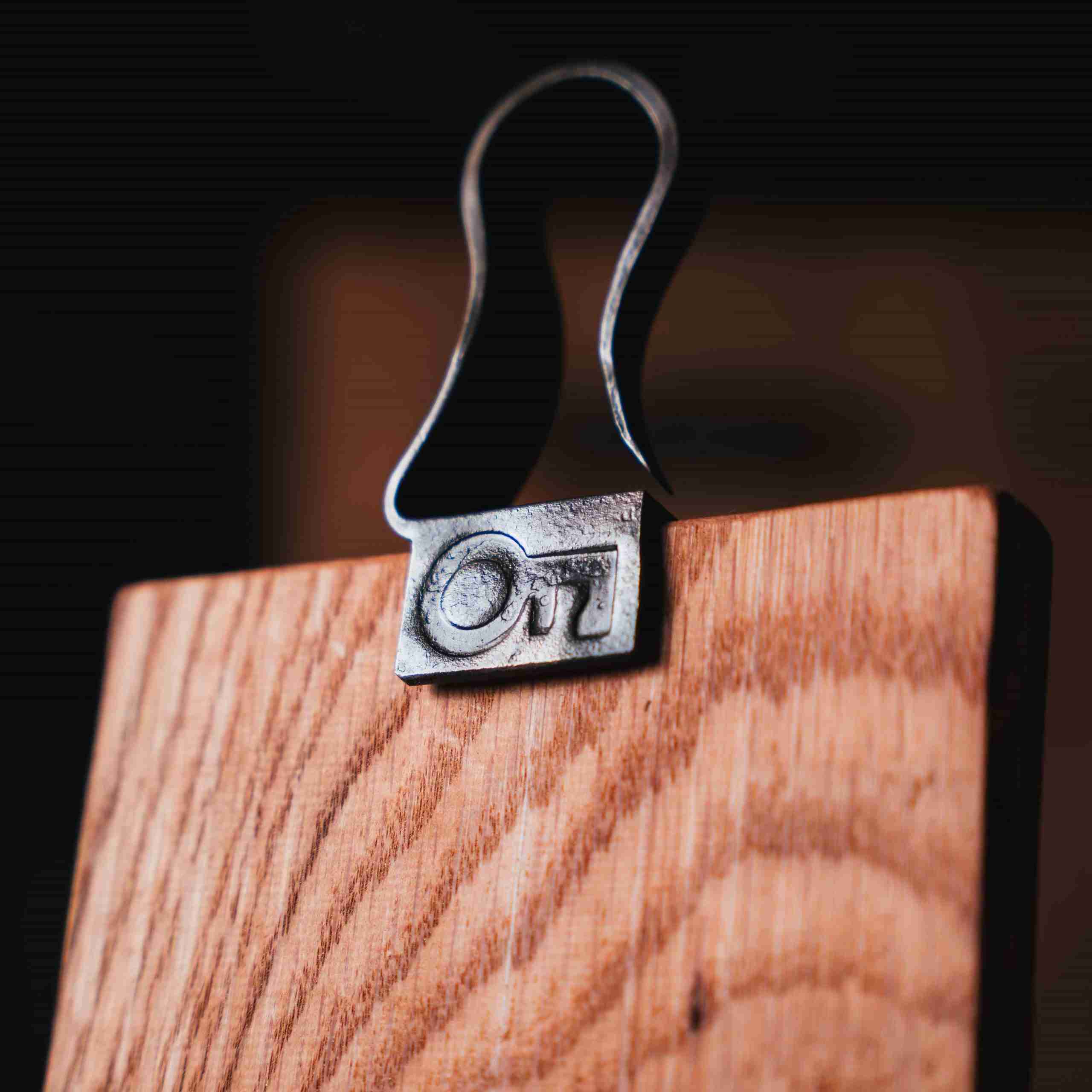Wooden chopping board with branded detail