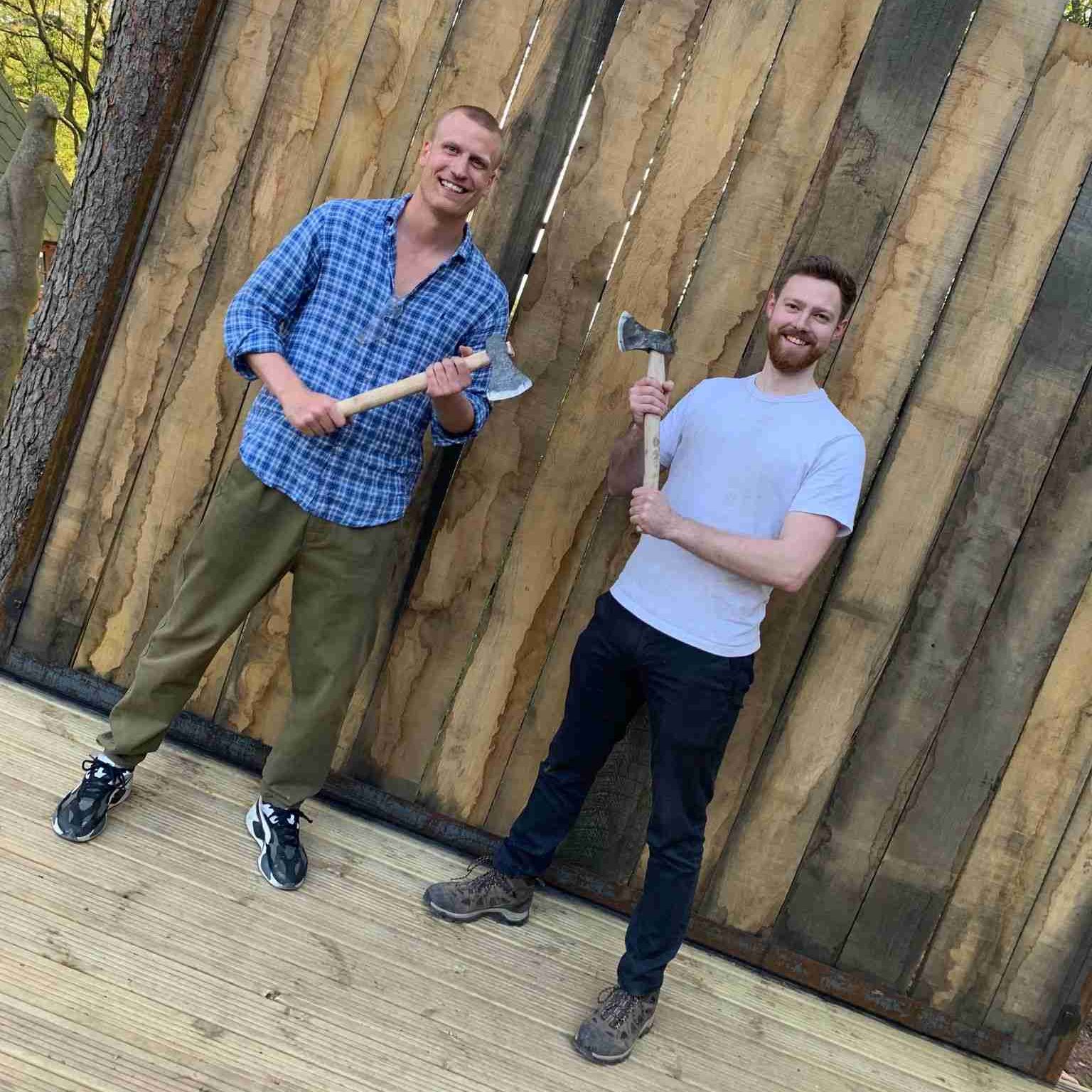 Guys holding an axe